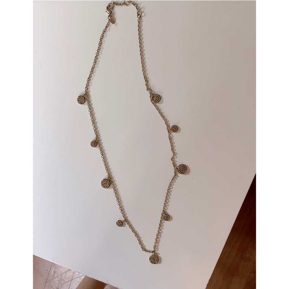 Gold necklace with beaded medallions